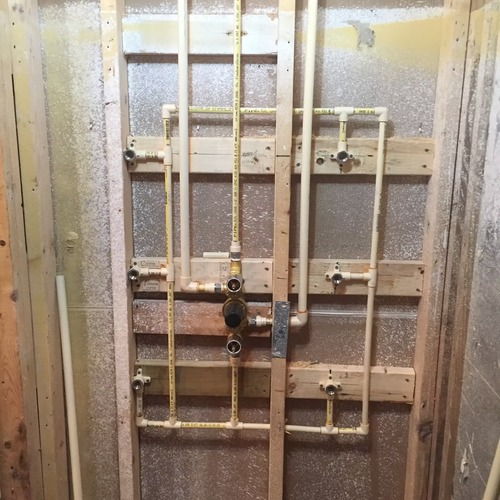 several pipes inside a wall